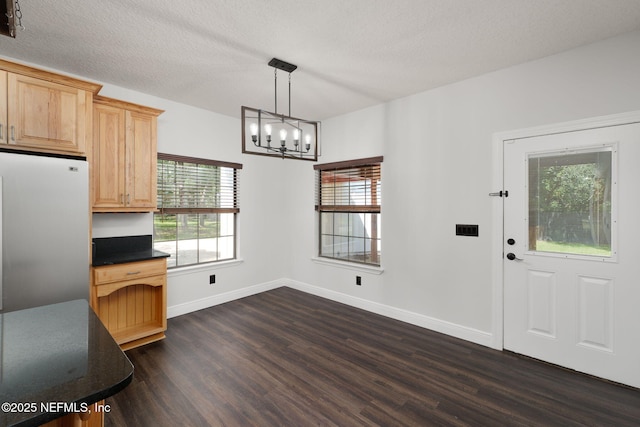 2871 Anchor Rd, Middleburg, FL 32068 - kitchen featuring refrigerator, light brown cabinets, dark wood finished floors, a chandelier, and dark countertops