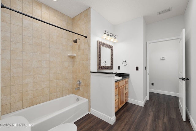 2871 Anchor Rd, Middleburg, FL 32068 - bathroom with wood finished floors, vanity, and bathtub / shower combination