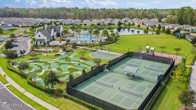 102 Anguilla Blvd, Saint Augustine, FL 32092 - aerial perspective of suburban area with a pool area and a large body of water