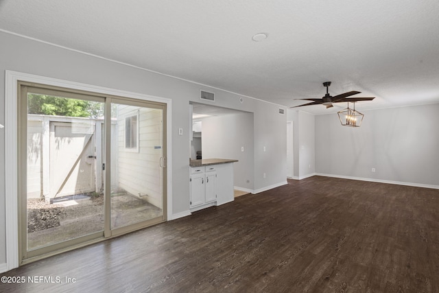 2300 Twelve Oaks Dr Unit K-14, Orange Park, FL 32065 - unfurnished room featuring dark wood-type flooring, a ceiling fan, and a textured ceiling