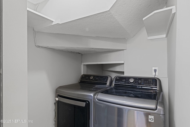 2300 Twelve Oaks Dr Unit K-14, Orange Park, FL 32065 - washroom with independent washer and dryer and a textured ceiling