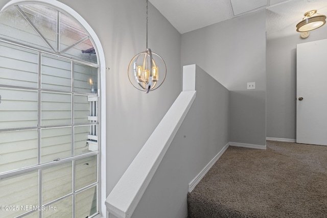 2300 Twelve Oaks Dr Unit K-14, Orange Park, FL 32065 - stairway with carpet floors and a chandelier