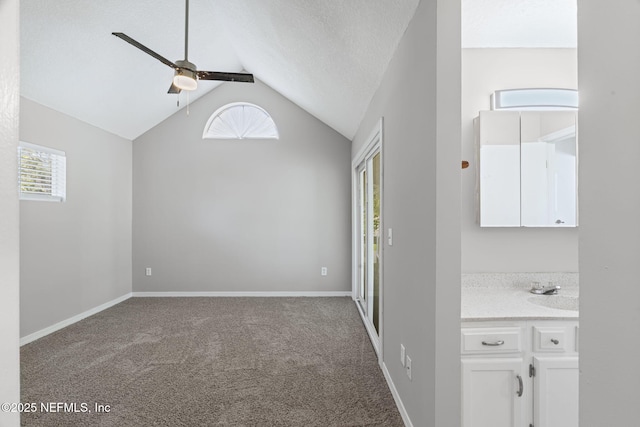 2300 Twelve Oaks Dr Unit K-14, Orange Park, FL 32065 - empty room with carpet floors, lofted ceiling, a ceiling fan, and a textured ceiling