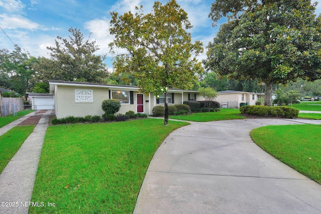 239 Glynlea Rd, Jacksonville, FL 32216 - single story home featuring brick siding, driveway, and a garage