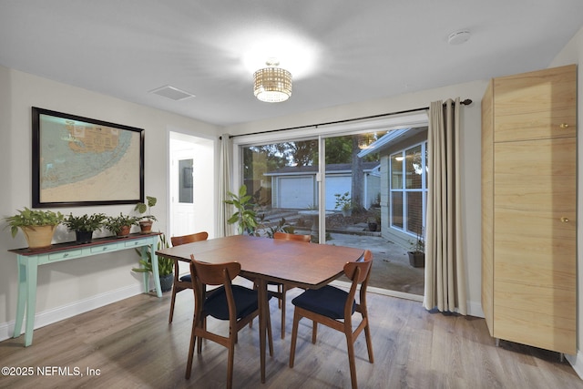 239 Glynlea Rd, Jacksonville, FL 32216 - dining area with wood finished floors