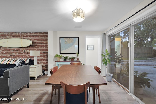 239 Glynlea Rd, Jacksonville, FL 32216 - dining area with light wood-style floors