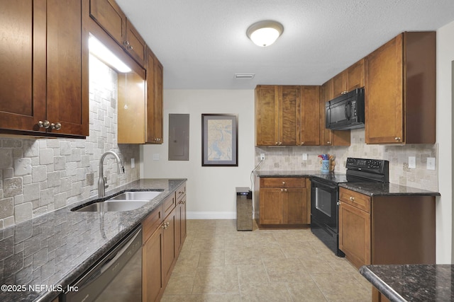 239 Glynlea Rd, Jacksonville, FL 32216 - kitchen with black appliances, tasteful backsplash, dark stone counters, electric panel, and brown cabinets