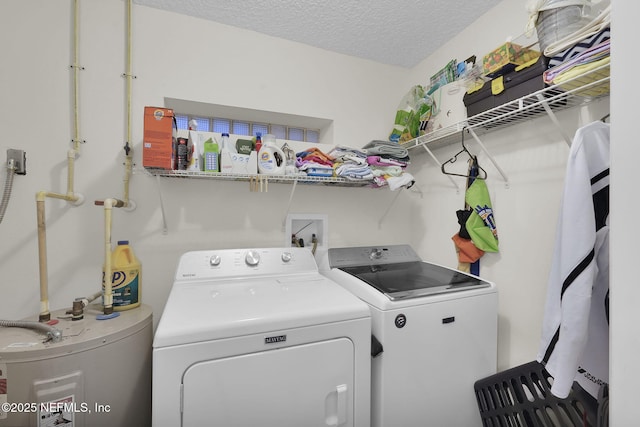 239 Glynlea Rd, Jacksonville, FL 32216 - laundry area with water heater, independent washer and dryer, and a textured ceiling