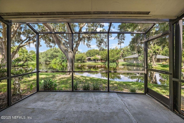 404 Villa Del Mar Dr Unit J-4, Ponte Vedra Beach, FL 32082 - unfurnished sunroom featuring a water view and view of scattered trees