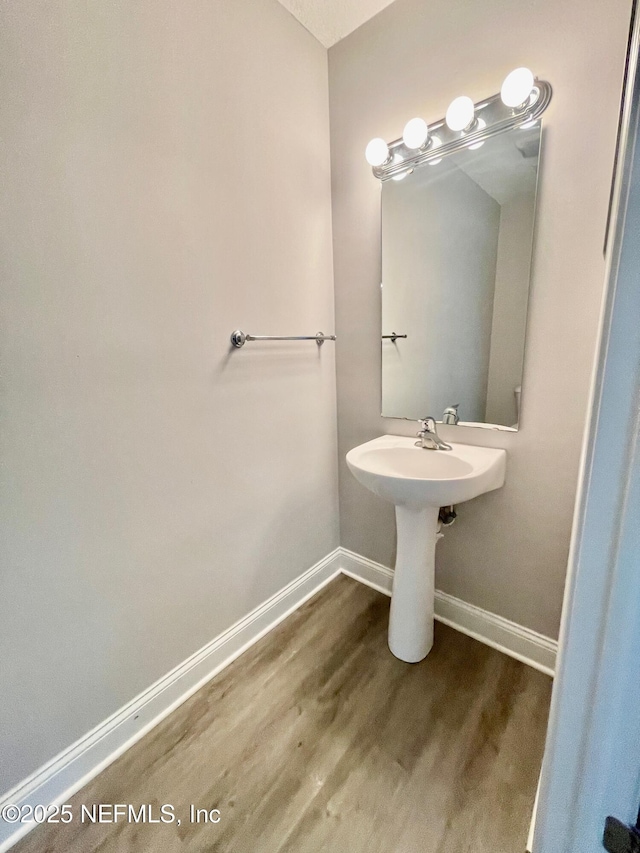 86069 Pineview Dr, Yulee, FL 32097 - bathroom featuring wood finished floors and baseboards