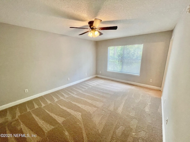 86069 Pineview Dr, Yulee, FL 32097 - unfurnished room with light colored carpet, ceiling fan, and a textured ceiling