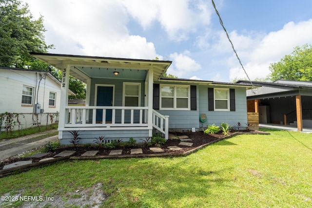 3312 Dellwood Ave, Jacksonville, FL 32205 - view of front of house featuring a carport and a porch