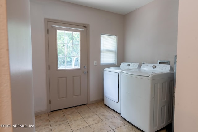 3312 Dellwood Ave, Jacksonville, FL 32205 - laundry area with independent washer and dryer and light tile patterned flooring