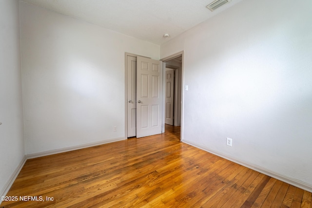 3312 Dellwood Ave, Jacksonville, FL 32205 - empty room featuring light wood-type flooring and baseboards
