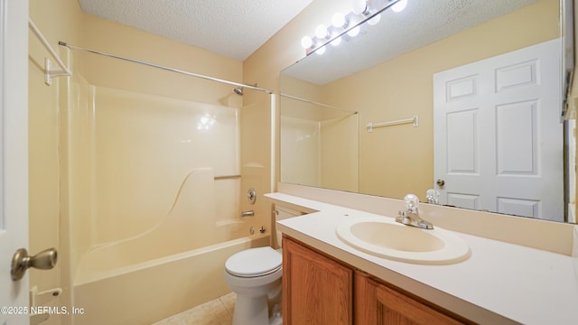 2109 Hovington Cir W, Jacksonville, FL 32246 - full bath with shower / bathtub combination, a textured ceiling, vanity, and tile patterned floors