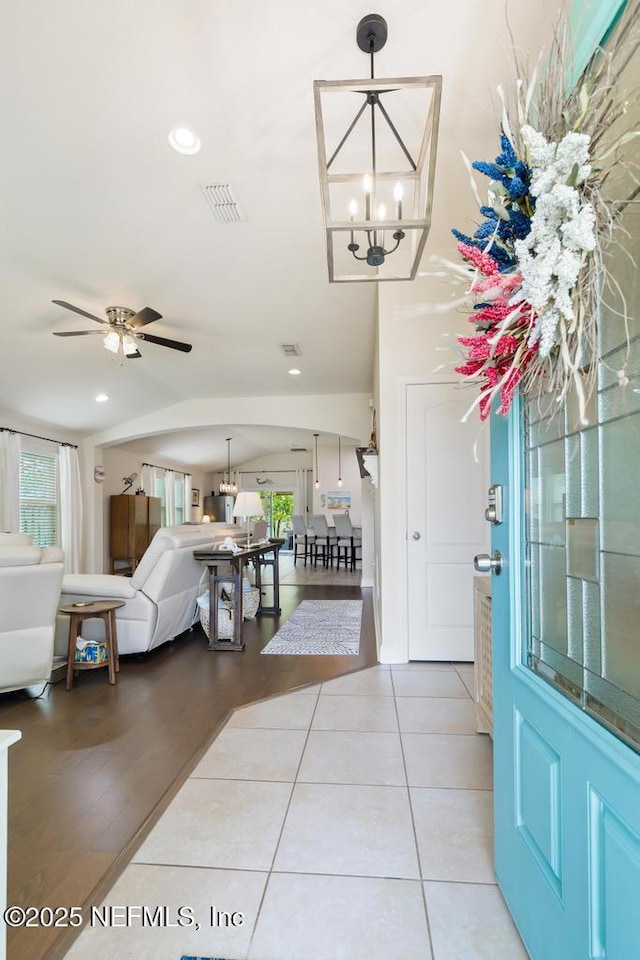 75078 Glenspring Way, Yulee, FL 32097 - tiled foyer with a chandelier, a ceiling fan, and recessed lighting