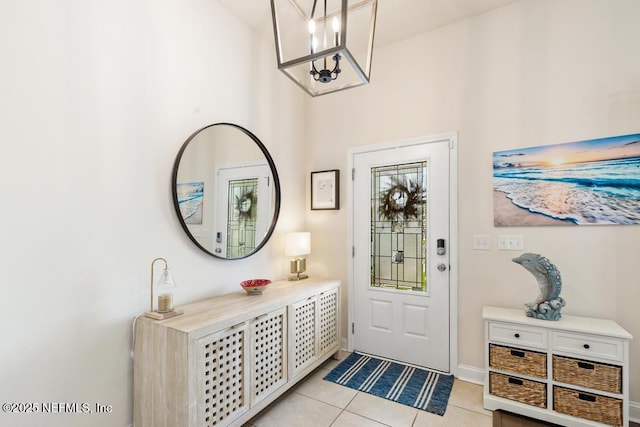 75078 Glenspring Way, Yulee, FL 32097 - entrance foyer featuring light tile patterned floors and a chandelier