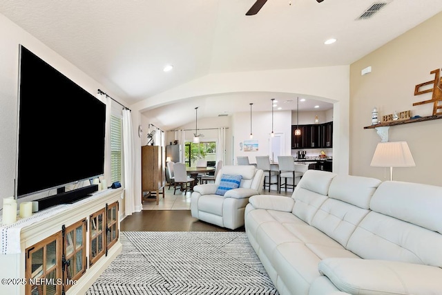 75078 Glenspring Way, Yulee, FL 32097 - living room with arched walkways, vaulted ceiling, ceiling fan, and recessed lighting