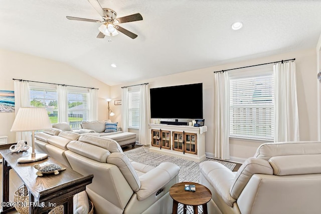 75078 Glenspring Way, Yulee, FL 32097 - living area featuring vaulted ceiling, a ceiling fan, and recessed lighting