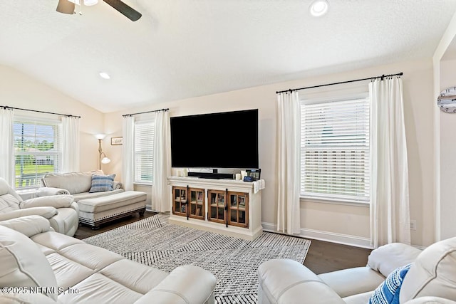 75078 Glenspring Way, Yulee, FL 32097 - living area featuring lofted ceiling, ceiling fan, and wood finished floors