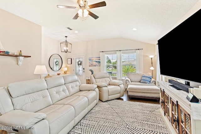 75078 Glenspring Way, Yulee, FL 32097 - living room with a ceiling fan, lofted ceiling, a chandelier, and recessed lighting