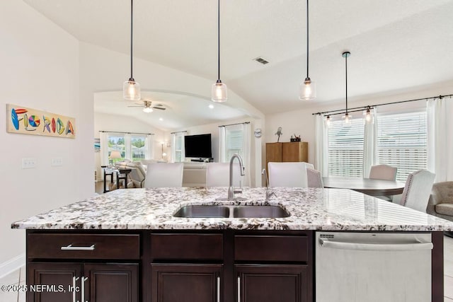 75078 Glenspring Way, Yulee, FL 32097 - kitchen featuring stainless steel dishwasher, vaulted ceiling, open floor plan, dark brown cabinetry, and ceiling fan