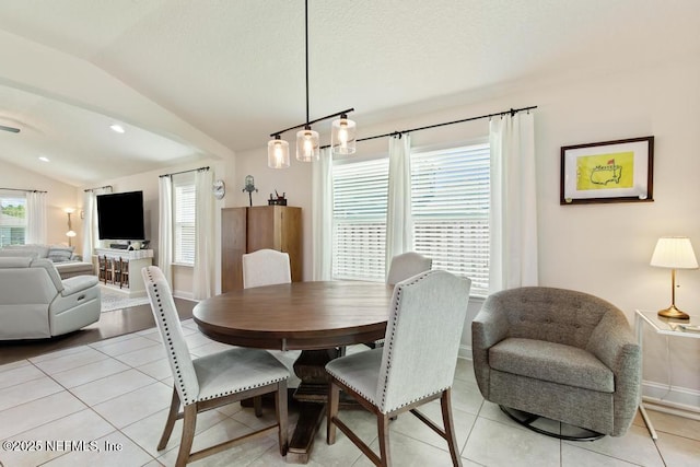 75078 Glenspring Way, Yulee, FL 32097 - dining room with vaulted ceiling and light tile patterned floors