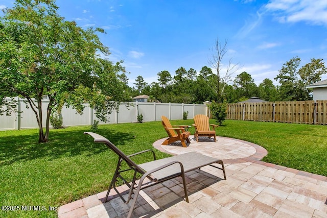 75078 Glenspring Way, Yulee, FL 32097 - fenced backyard with a patio area