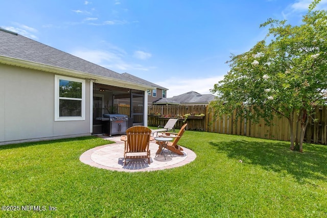 75078 Glenspring Way, Yulee, FL 32097 - fenced backyard with a patio area and a sunroom