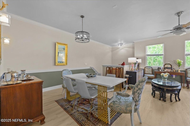 25 Riverview Bnd N Unit 122, Palm Coast, FL 32137 - dining room featuring light wood finished floors, crown molding, and a ceiling fan