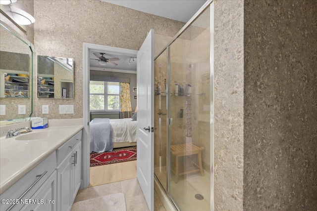 25 Riverview Bnd N Unit 122, Palm Coast, FL 32137 - ensuite bathroom featuring vanity, a stall shower, and ceiling fan