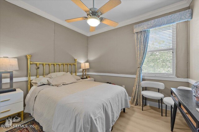 25 Riverview Bnd N Unit 122, Palm Coast, FL 32137 - bedroom with crown molding, wood finished floors, and ceiling fan