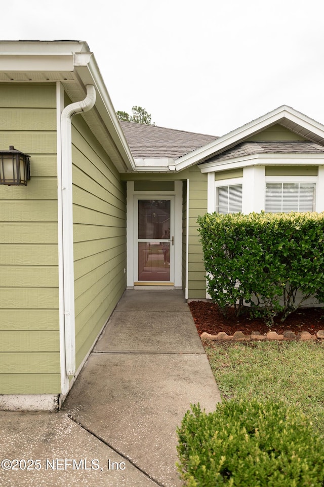 3013 Wavering Ln, Middleburg, FL 32068 - property entrance featuring roof with shingles