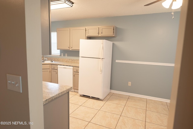 3013 Wavering Ln, Middleburg, FL 32068 - kitchen with white appliances, light countertops, a ceiling fan, and light tile patterned floors