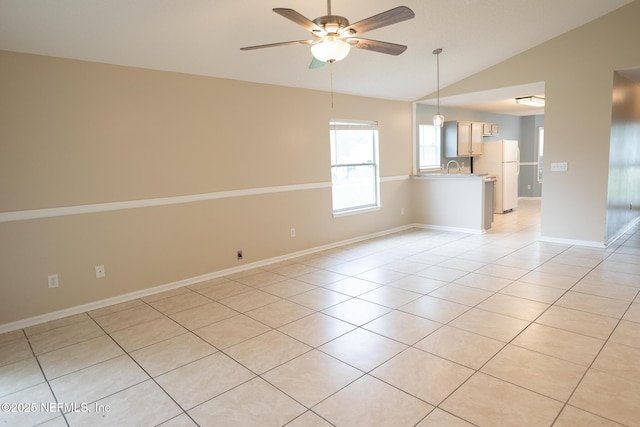 3013 Wavering Ln, Middleburg, FL 32068 - spare room with lofted ceiling, a ceiling fan, and light tile patterned flooring