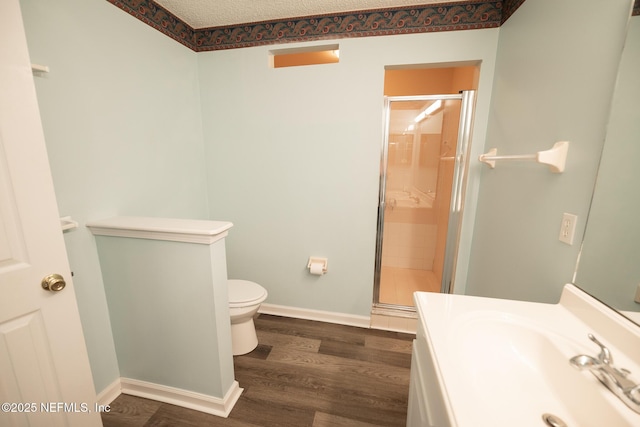 3013 Wavering Ln, Middleburg, FL 32068 - full bath with a shower stall, wood finished floors, vanity, and a textured ceiling