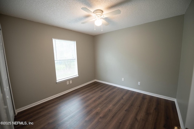 3013 Wavering Ln, Middleburg, FL 32068 - empty room with dark wood finished floors, a ceiling fan, and a textured ceiling