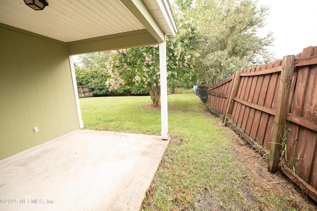 3013 Wavering Ln, Middleburg, FL 32068 - fenced backyard featuring a patio