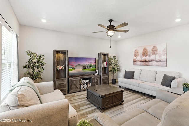 9217 Gilmore Grove Way, Jacksonville, FL 32211 - living area featuring light wood-style flooring, ceiling fan, and recessed lighting
