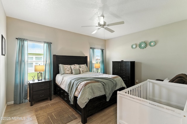 9217 Gilmore Grove Way, Jacksonville, FL 32211 - bedroom featuring light wood-style flooring and ceiling fan