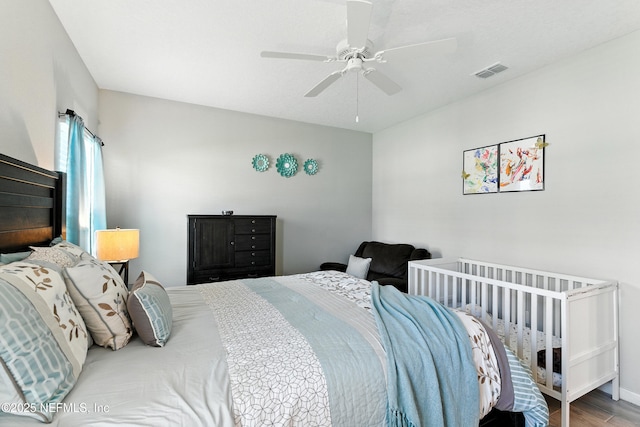 9217 Gilmore Grove Way, Jacksonville, FL 32211 - bedroom with wood finished floors and ceiling fan