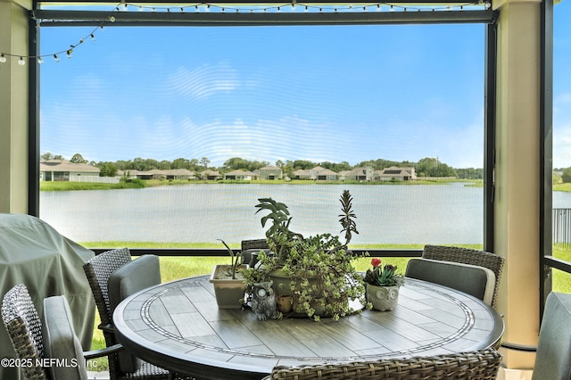 9217 Gilmore Grove Way, Jacksonville, FL 32211 - sunroom featuring a water view