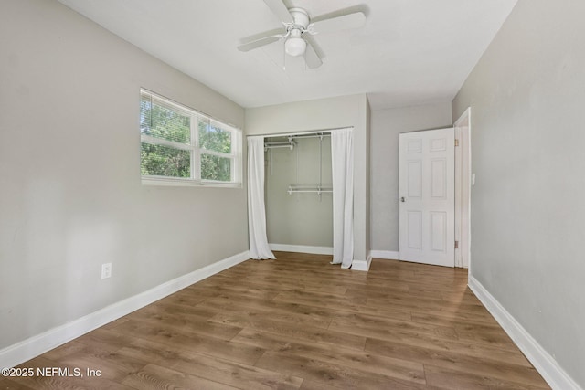 243 Ravenswood Dr, Saint Augustine, FL 32084 - unfurnished bedroom with wood finished floors, a closet, and ceiling fan