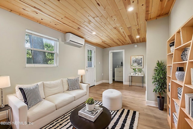 243 Ravenswood Dr, Saint Augustine, FL 32084 - living area with a wall unit AC, washer / dryer, wood ceiling, light wood finished floors, and recessed lighting