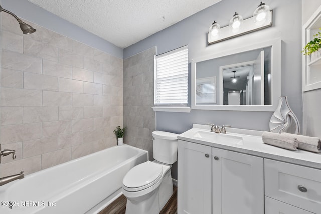 13254 Karla Cove Ln, Jacksonville, FL 32225 - bathroom featuring vanity, a textured ceiling, and washtub / shower combination