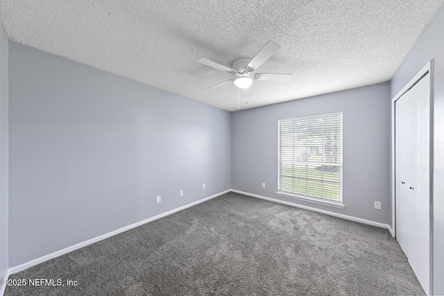 13254 Karla Cove Ln, Jacksonville, FL 32225 - unfurnished bedroom with carpet flooring, a textured ceiling, a closet, and a ceiling fan