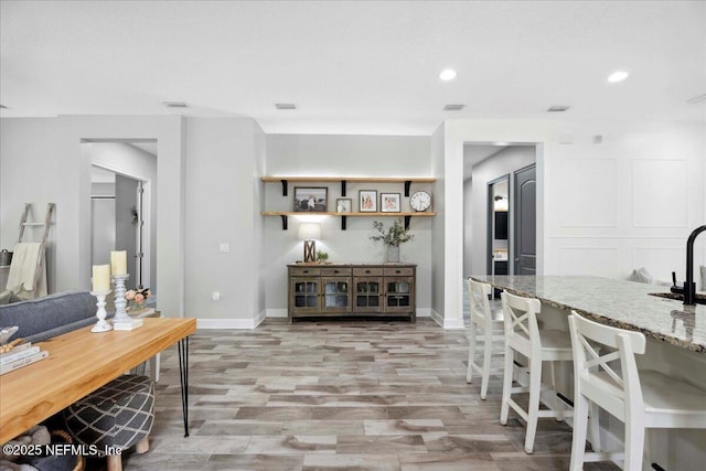 395 Jennie Lake Ct, Saint Johns, FL 32095 - dining room with light wood-style floors and recessed lighting