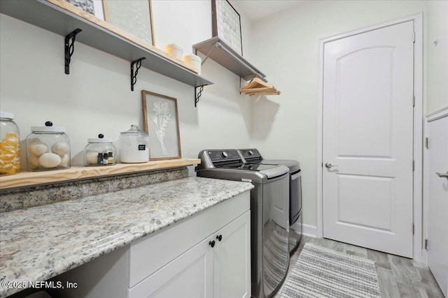 395 Jennie Lake Ct, Saint Johns, FL 32095 - laundry room featuring independent washer and dryer and light wood-style floors