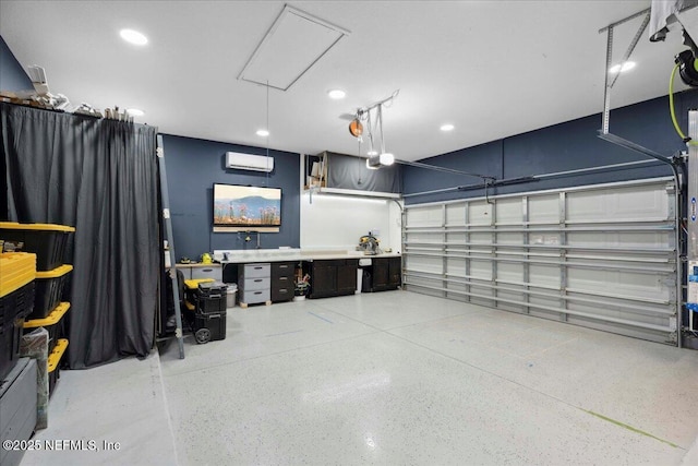 395 Jennie Lake Ct, Saint Johns, FL 32095 - garage featuring recessed lighting and an AC wall unit
