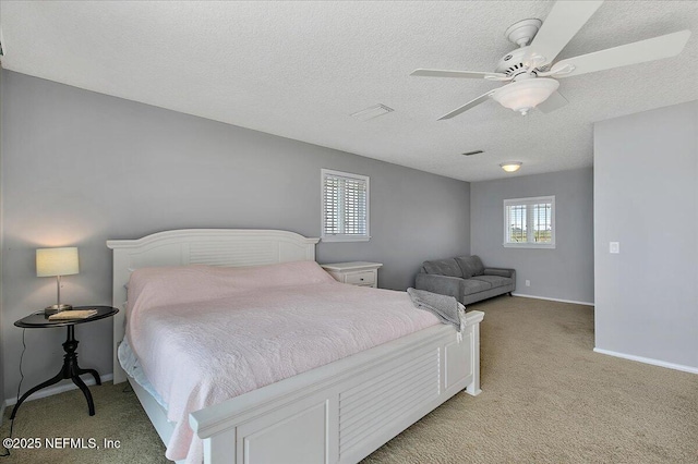 2481 S Ponte Vedra Blvd, Ponte Vedra Beach, FL 32082 - bedroom featuring light carpet, a textured ceiling, and a ceiling fan